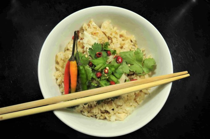 Tom Ka Gai Rice Garnished with Cilantro and Thai Peppers