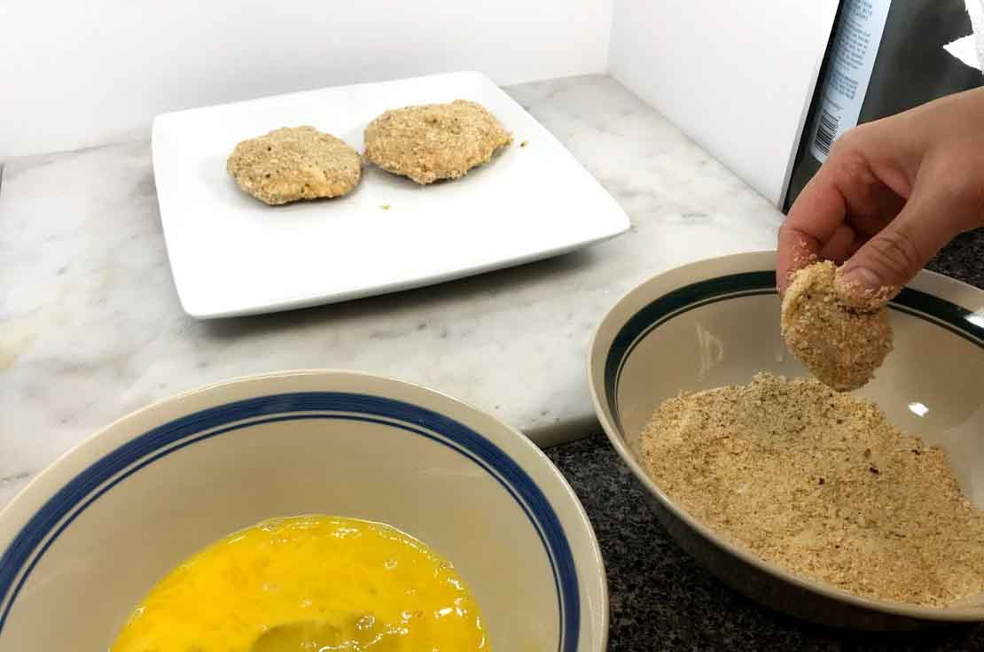 Dipping Thai Crabby Patties in Eggs and Crumbs