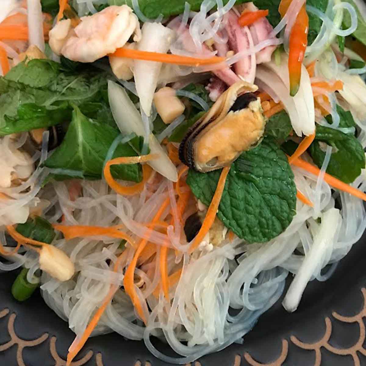 Glass Noodles Seafood Salad is an easy, healthy Thai salad that you can modify to meet your specific tastes and needs.